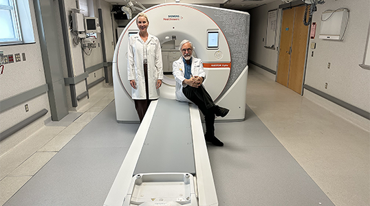 Dr. Eric A. Hoffman (right), Advanced Pulmonary Physiomic Imaging Laboratory (APPIL) Director, and Dr. Jessica C. Sieren (left), APPIL Deputy Director. 